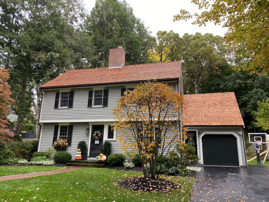 Two Story House and Garage With New Roof